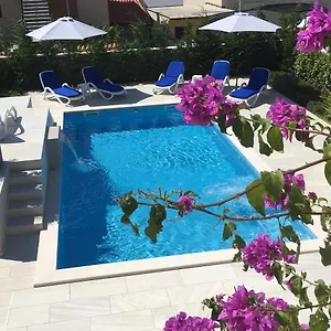 With Heated Pool, Regina Pula